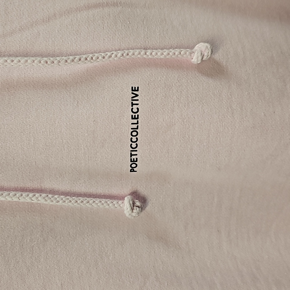 Poetic collective pink hoodie